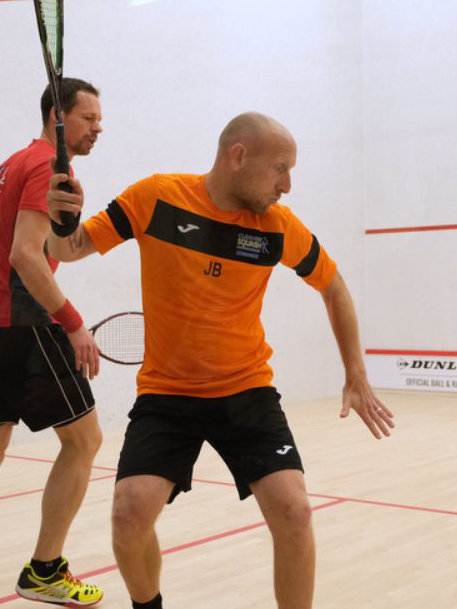 A photo of James Bowden, squash coach